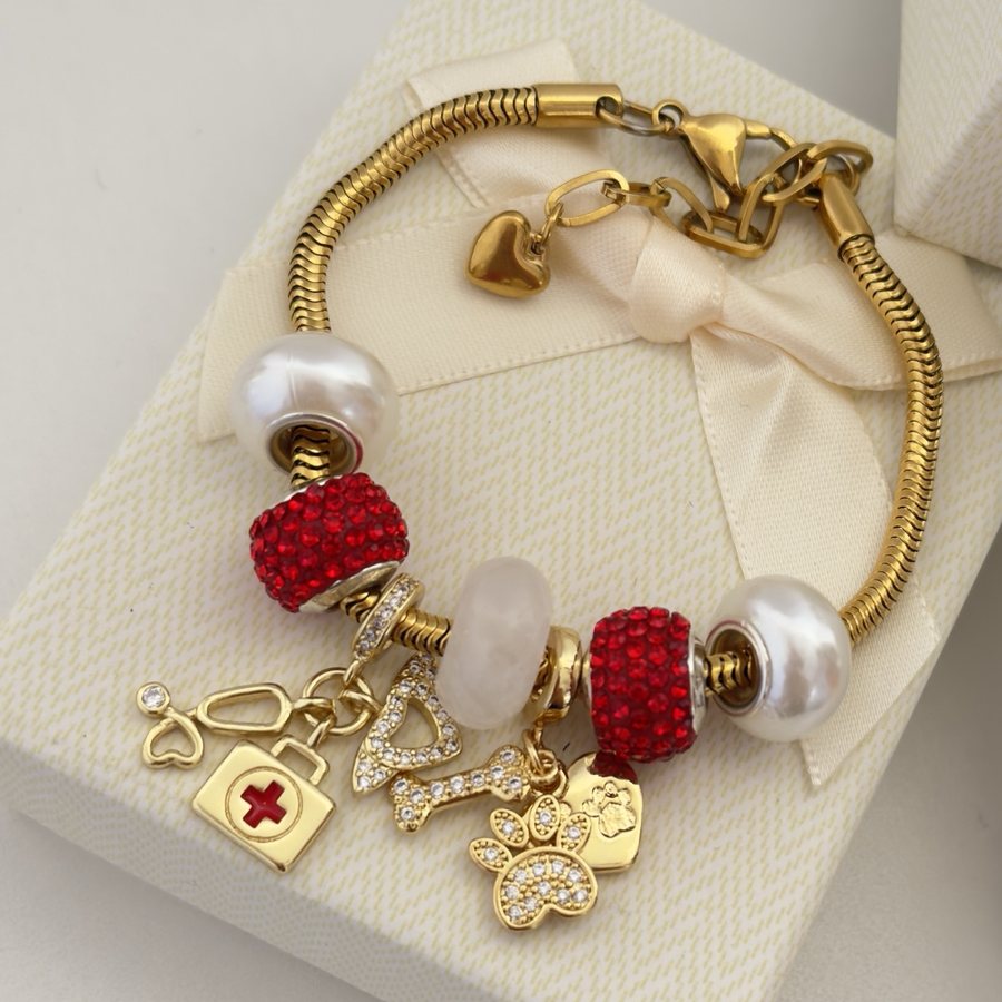 Pulsera Vocación: para quien cuida: botiquín, estetoscopio y huellita